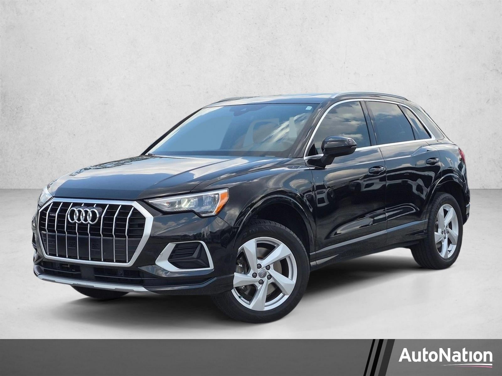 2019 Audi Q3 2.0 TFSI Premium quattro in Mythos Black Metallic — front three-quarter view