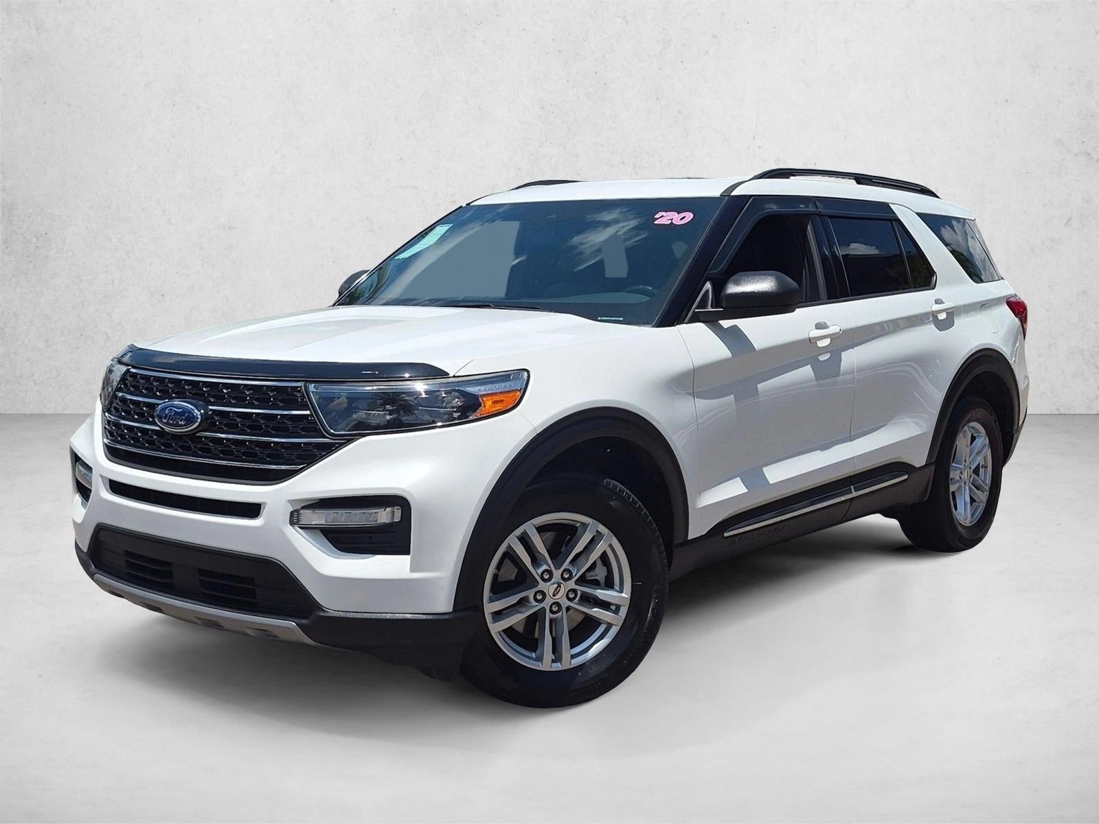 2020 Ford Explorer XLT 4WD in Star White Metallic Tri-Coat — front three-quarter view